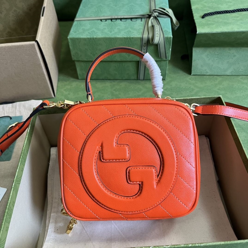 G*u*i top handle bags